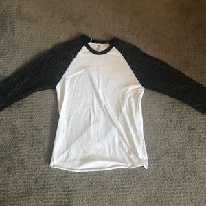 Black and white speckled baseball tee